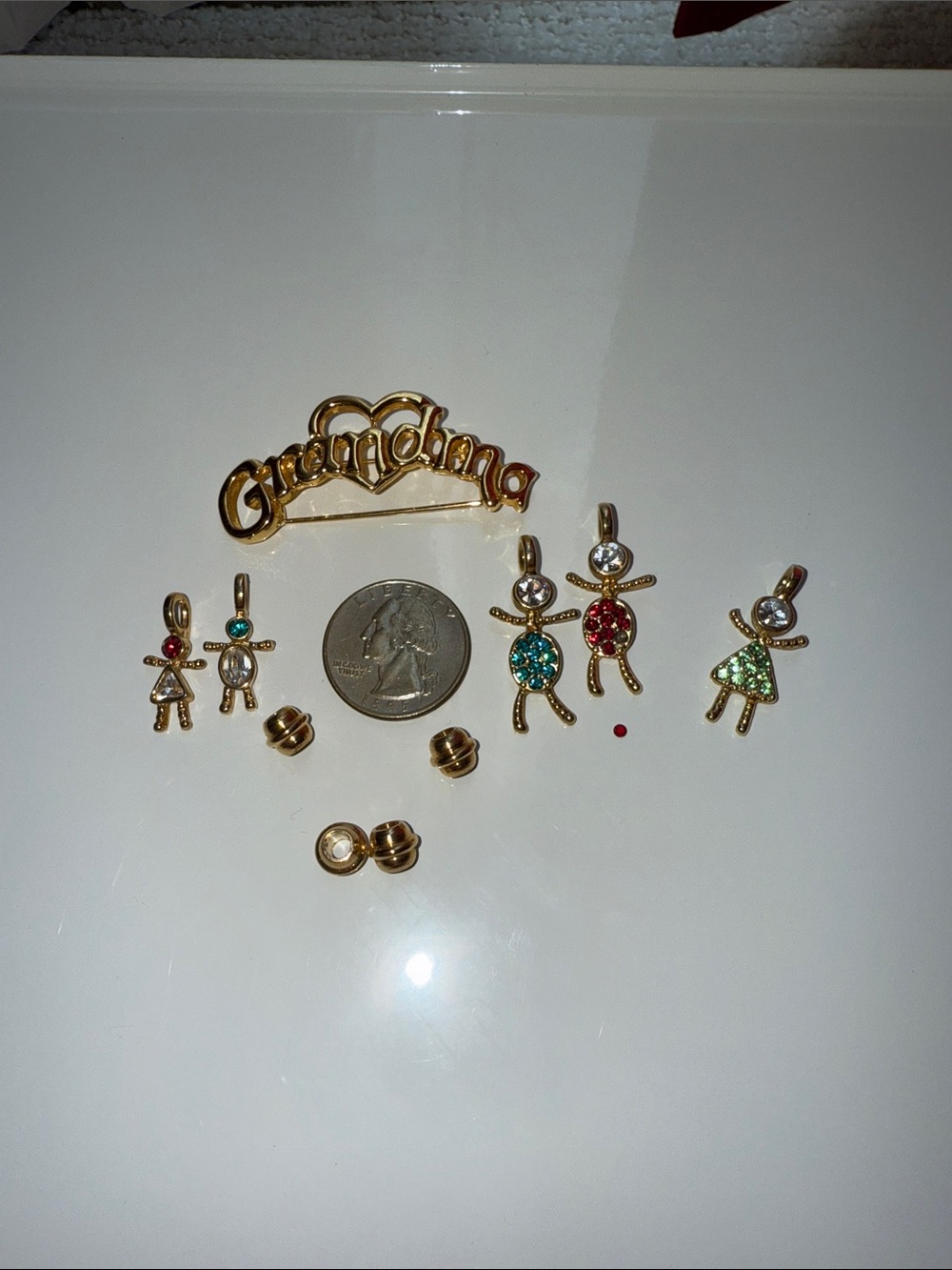 Gold-tone 'Grandma' Pin with Small Crystal Family Charms